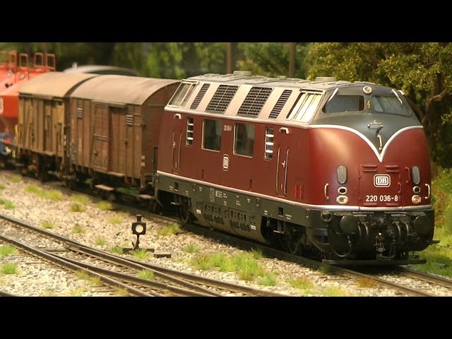 Model trains in O scale with strikingly realistic landscape