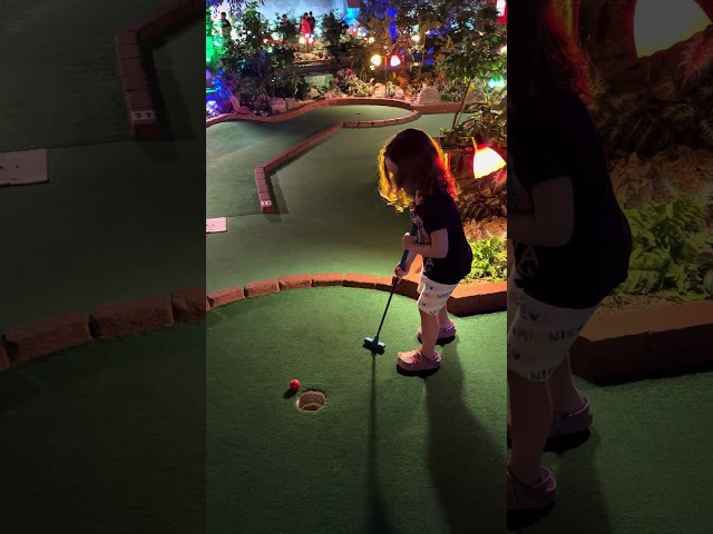 Skylar Having Some Fun Playing Indoor Mini Golf At Grand Country In Branson Missouri