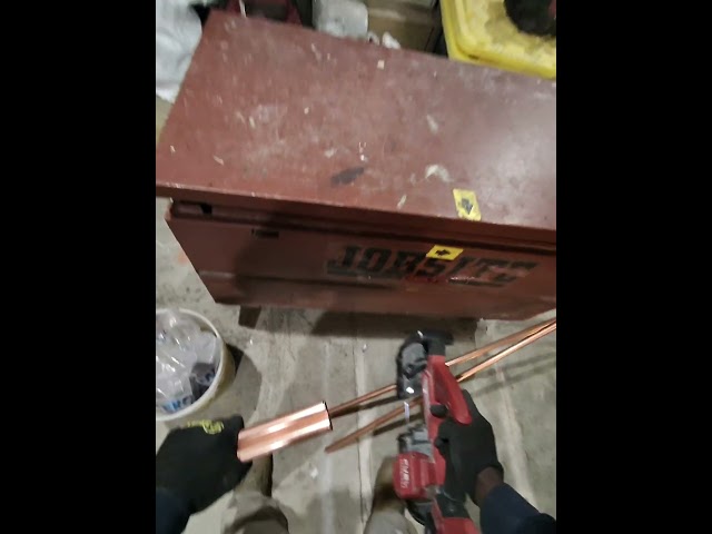 Using Milwaukee bandsaw #tools #plumbing #copperpipes #milwaukeetools