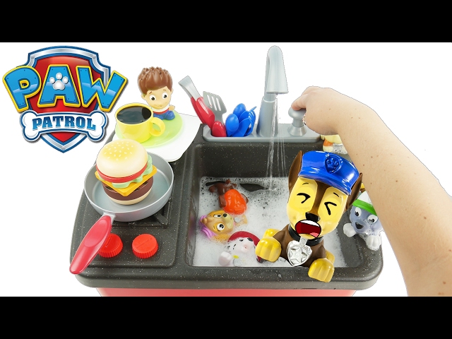 clean dishes in sink with Paw Patrol