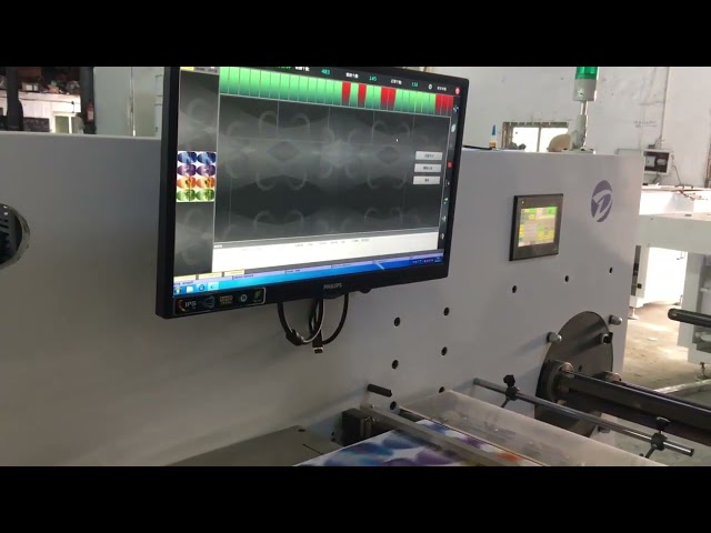 High speed label slitting and inspection machine