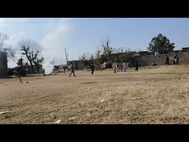 Children Playing Cricket in Village