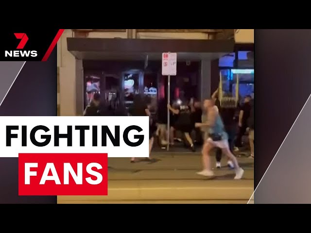 Flying furniture as a wild brawl between feuding soccer fans erupts on Swan Street | 7NEWS