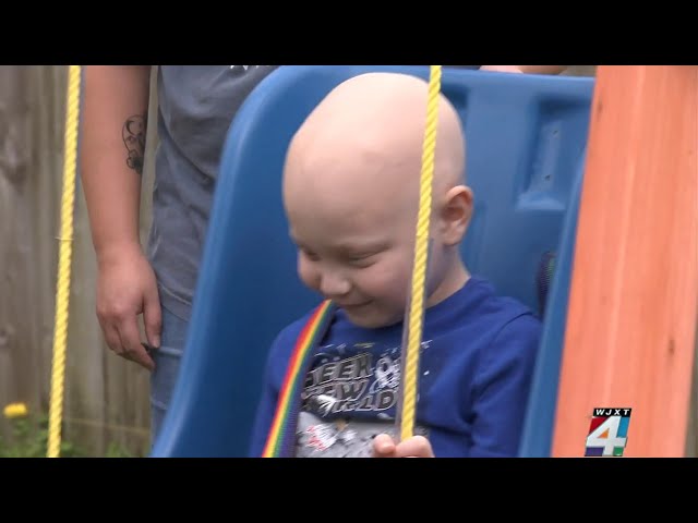 Green Cove Springs boy with brain tumor receives new playset thanks to local charity