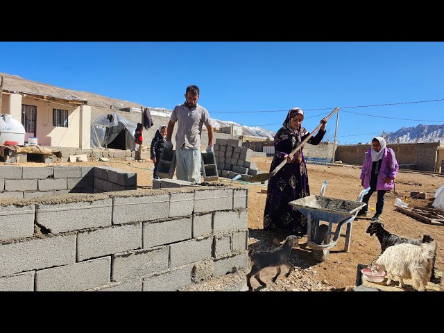 Nomadic Family Constructing a Stable for Their Goats