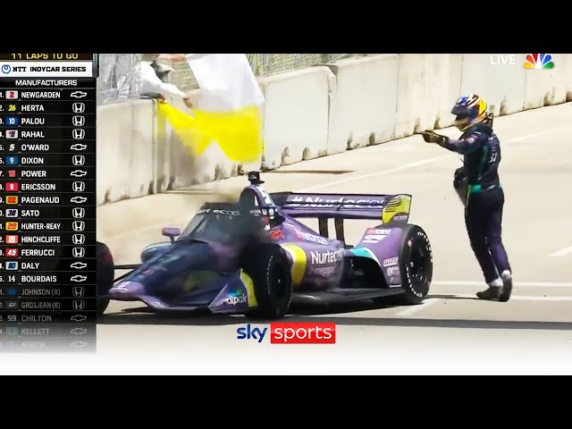 Romain Grosjean runs back to burning IndyCar to put out fire