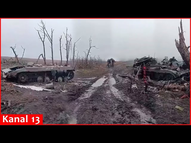 Russian soldiers show their fully destroyed military equipment after fierce battle in Kursk