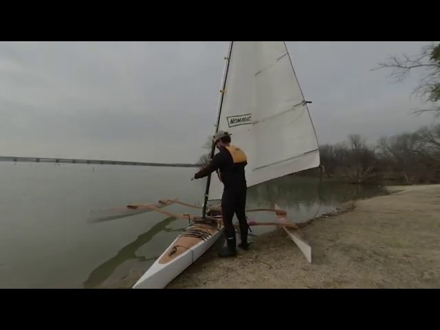 A vr180 video showing the restoration of a kayak sailboat