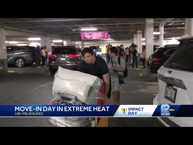 UW-Milwaukee students and families brave the extreme heat for the first day of move-in