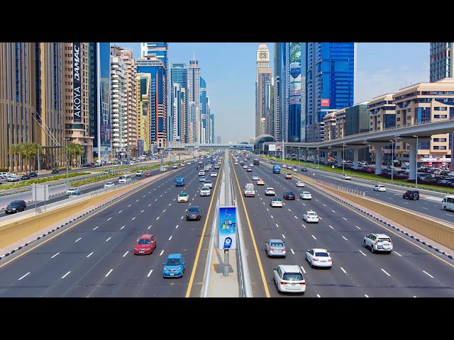 Enjoy a scenic drive through Dubai’s iconic Sheikh Zayed Road, capturing the city’s vibrant skyline.