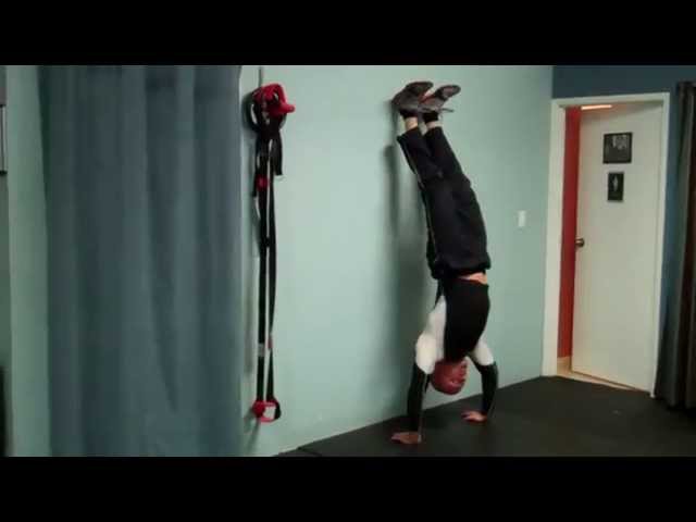 How to do Wall Handstand Pushups