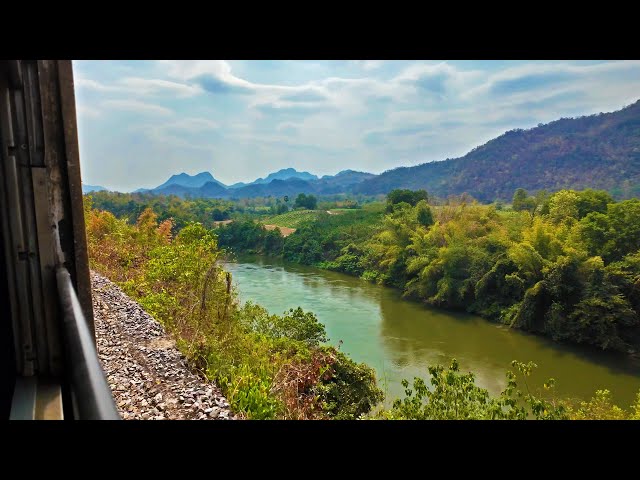 pov: you're riding a train through the thai countryside