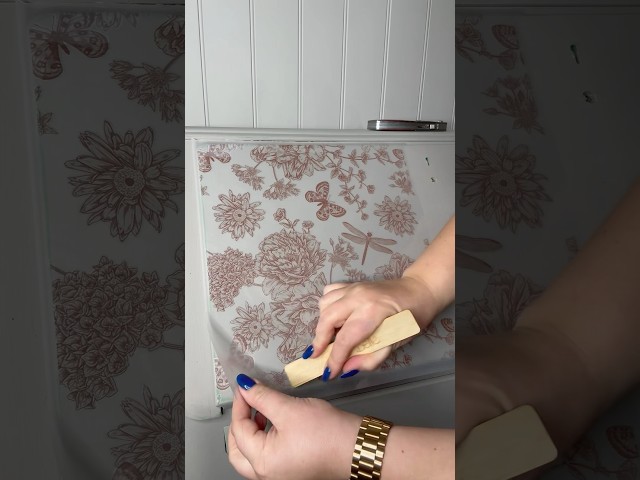 Applying the prettiest floral transfer! #furnituretransfer #furnitureart #furnituredecor #upcycling