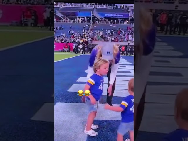 She thought it was a hand off and he was throwing a pass.😆#shorts #funny #nfl #probowl #kids  ￼