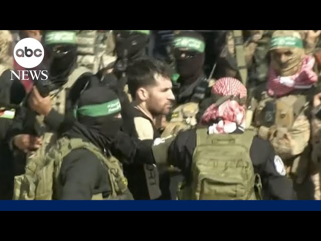 Special Report: Hamas escorts 3 hostages onto stage prior to release