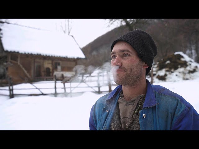 Lonely hard life of men in a high mountain village is far from civilization