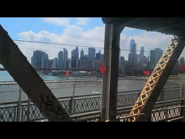 Crossing the Manhattan Bridge on the N train. June 2022.