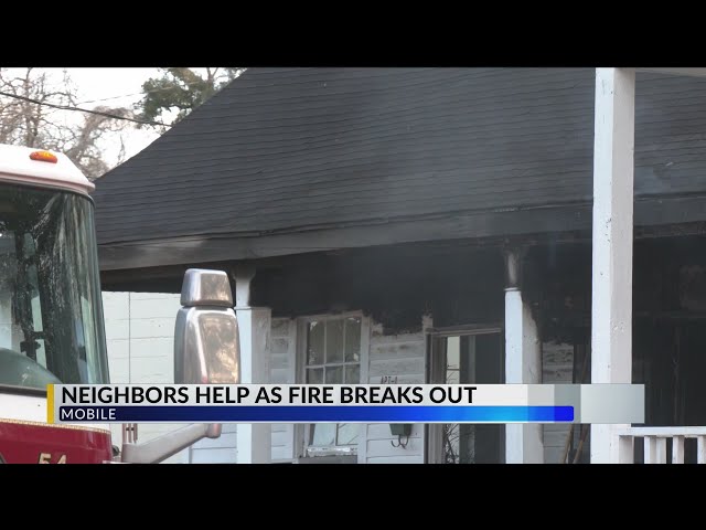 Neighbors help as fire breaks out at home in Mobile