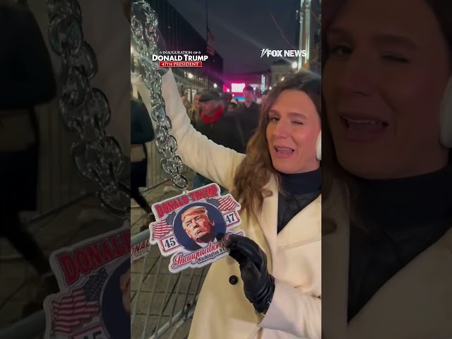 Alexis McAdams shows off Trump merchandise outside MAGA rally