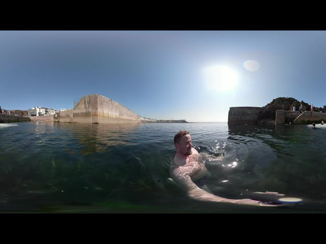 Northern Ireland harbour. Braving the freezing water Portstewart. 360 travel video.