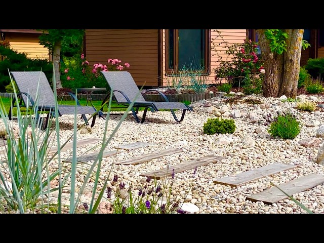 I am creating a flowerbed in a Mediterranean style. Rockery made of pebbles. Landscape design