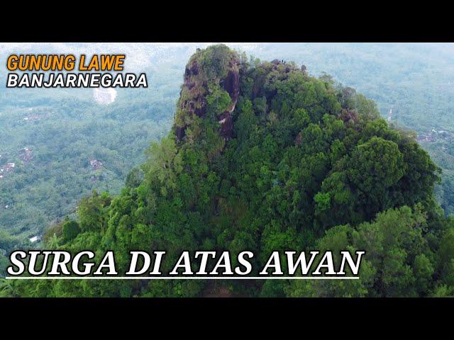 PENDAKIAN MENUJU GUNUNG LAWE SURGA DI ATAS AWAN YANG MEMUKAU