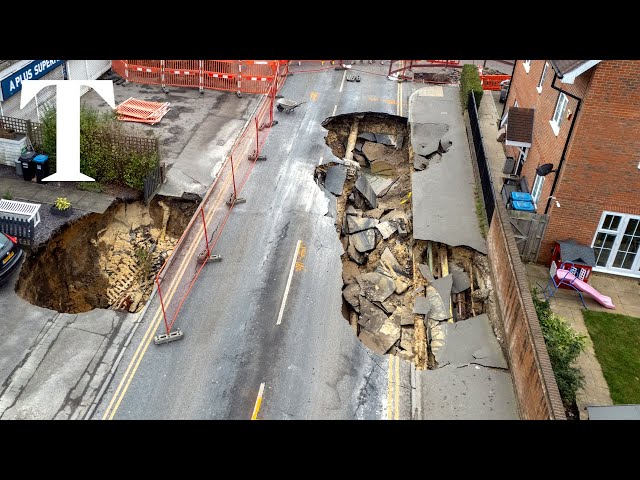 Two large sinkholes open up on Surrey high street