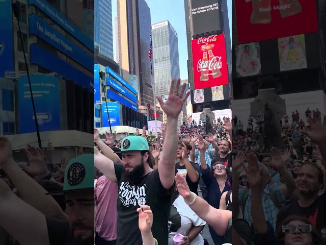 A sound of worship rising from Times Square