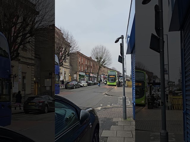 UK England's AMale in Black Riding A Scooter.2MOTORCYCLES ON FULL GEAR TO CENTRE.2DOUBLE DECKER.Cars