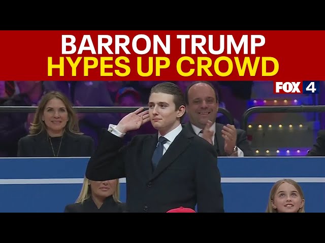 Barron Trump urges on cheering crowd at presidential parade