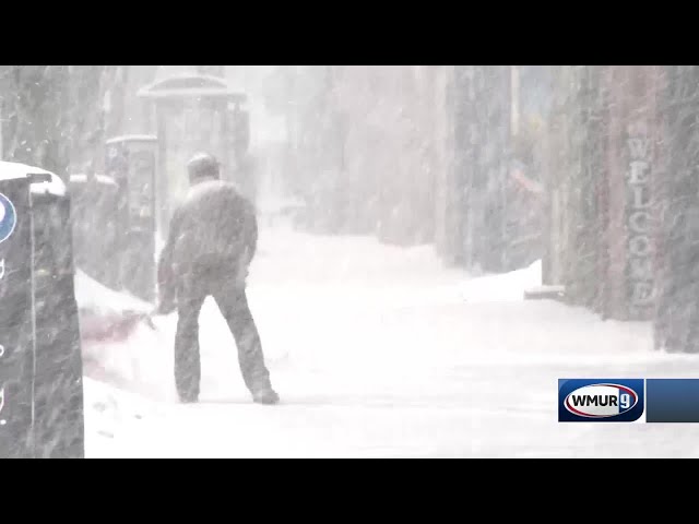 Crews work to clear snow in Manchester