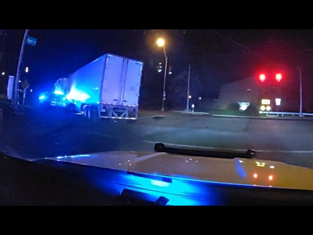 Dashcam video shows man leading Columbus officers on a chase in a semi, hitting cruiser