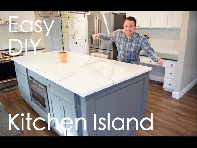 Easy DIY Kitchen Island with seating, storage, microwave under cabinet (marble quartz countertop)