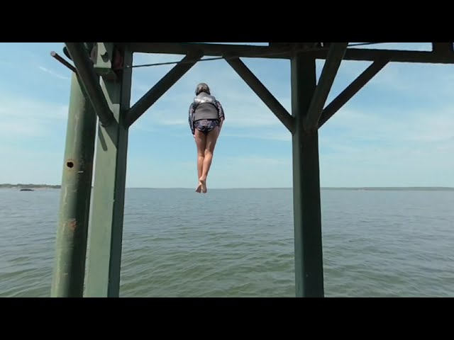 Jumping off a high dock, filmed in vr180