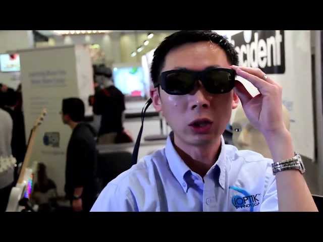 Innovega's wearable electronics allows users to see objects up close - CES 2014