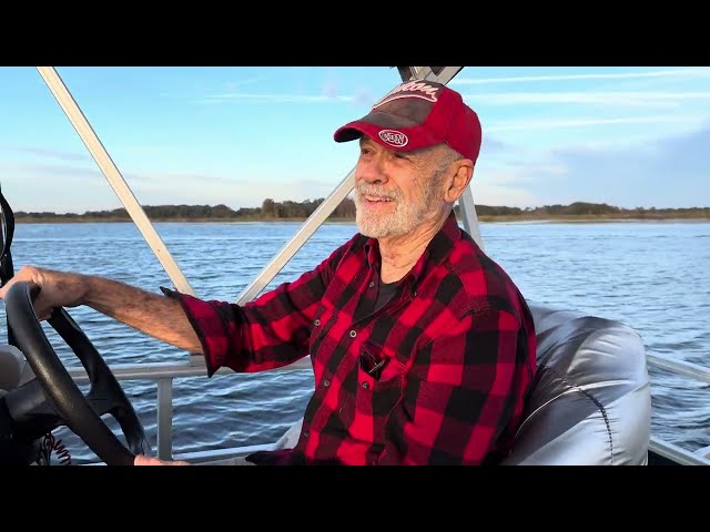 My Dad driving his boat on Lake Tsala Apopka