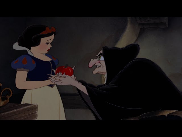 Snow White 1937 The Evil Queen tempts Snow White to bite the poisoned apple 4K