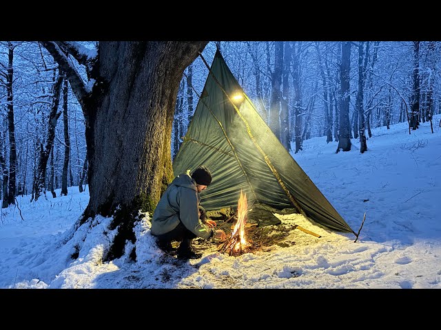 Surviving in sub-zero temperatures without a tent: Solo winter camping in a snowstorm