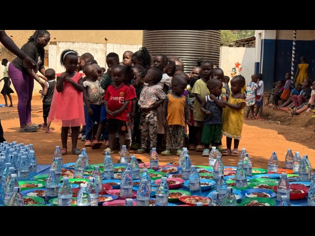 Fighting hunger, one plate of food at a time - 250 Children sharing a meal together.