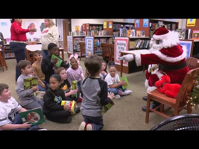 Santa Claus puts toy-making on pause to visit with Toledo Public Schools elementary students