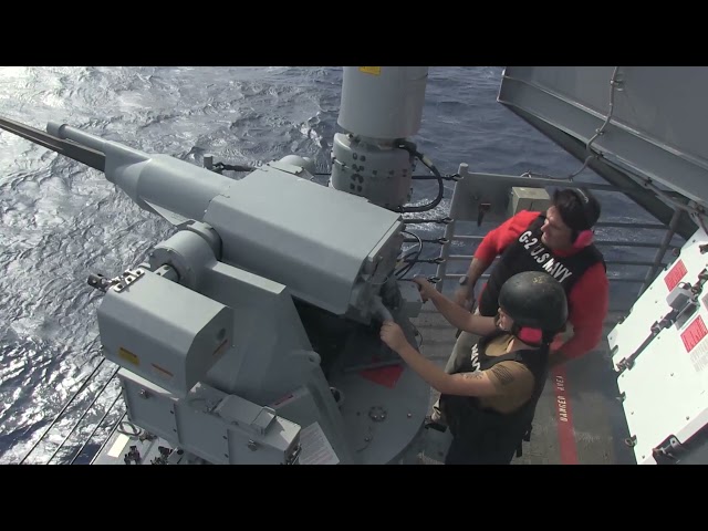 Live firing of Mk.38 25mm weapon aboard aircraft carrier