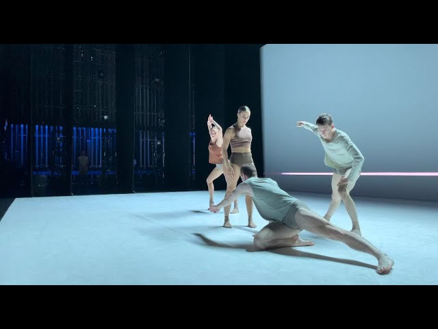 Company dancers on stage with the Australian String Quartet performing 'Impermanence'.