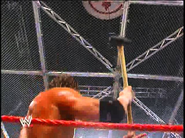 HHH hits Mr.McMahon with the sledgehammer- Unforgiven 2006