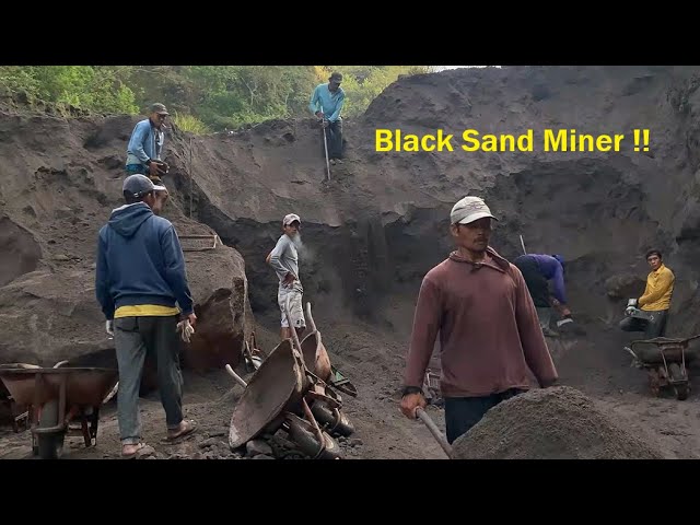 Black sand traditional miners work hard manually without excavators!