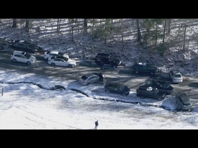 Stranded drivers abandon cars on icy roads