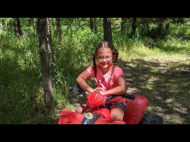 Twins 4 wheeling at the farm