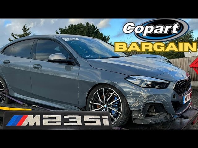 WE BOUGHT A CRASH DAMAGED BMW M235i FROM COPART SALVAGE AUCTION