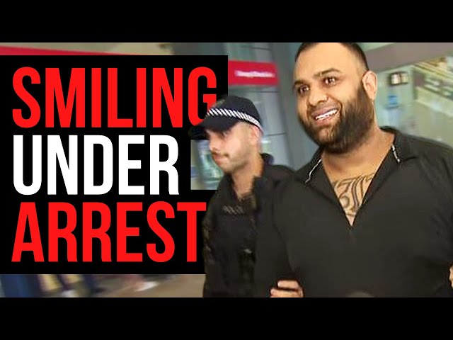 Accused crime boss all smiles under arrest 😁