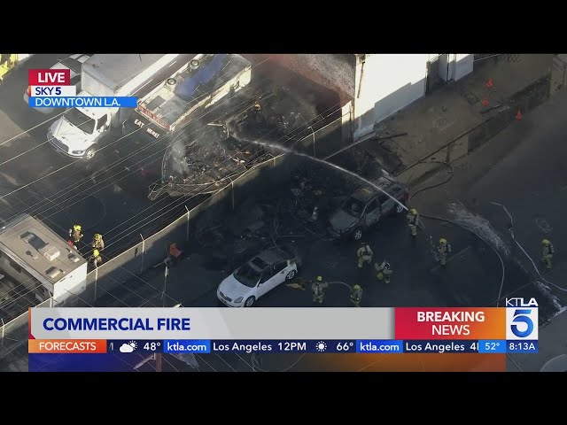 Commercial building fire sends thick plume of smoke over downtown L.A. during morning commute