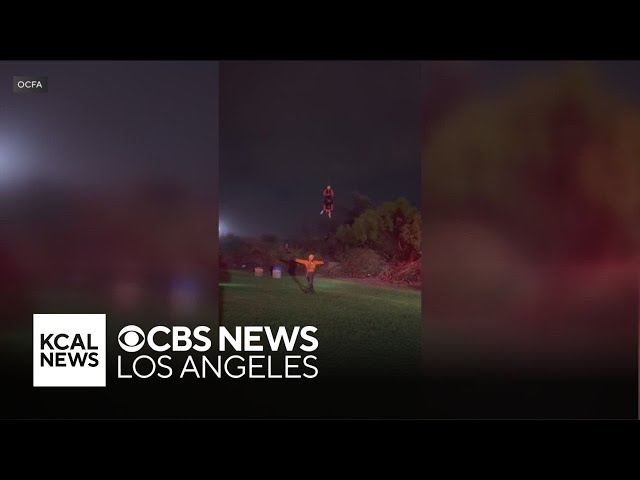 Couple rescued from rushing waters in Orange County